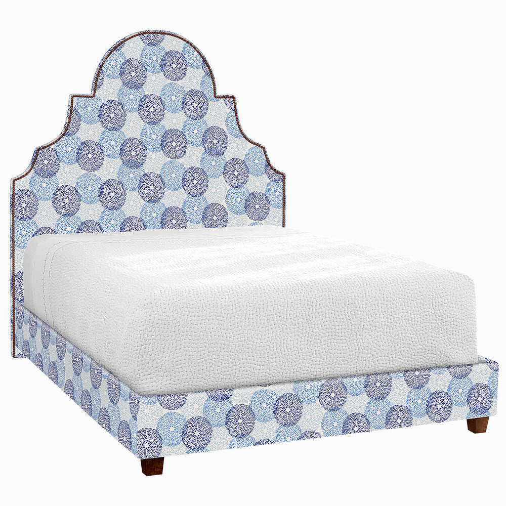 A Custom Dara Bed with a blue and white pattern available for shipping.