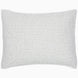 A white Organic Hand Stitched Moss Quilt pillow with hand stitched green dots on organic cotton voile by John Robshaw.