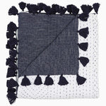 A Sahati Ink Throw blanket by Throws, hand-stitched navy and white with tassels made from super fine cotton. - 28215066886190